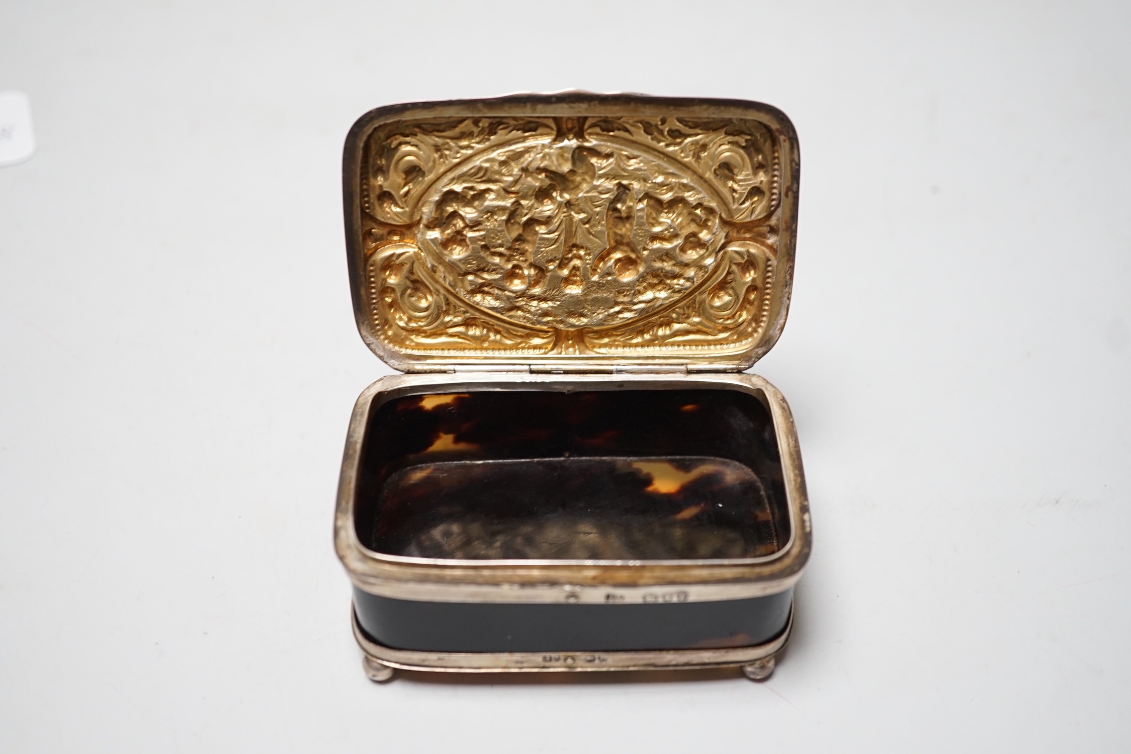 A late Victorian silver mounted tortoiseshell rectangular box and cover, on ball feet, Joseph Braham, London, 1890, 85mm.
